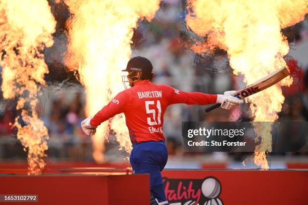 England batsman Jonny Bairstow comes out to bat through the flames during the 2nd Vitality T20I match between England and New Zealand at Emirates Old...