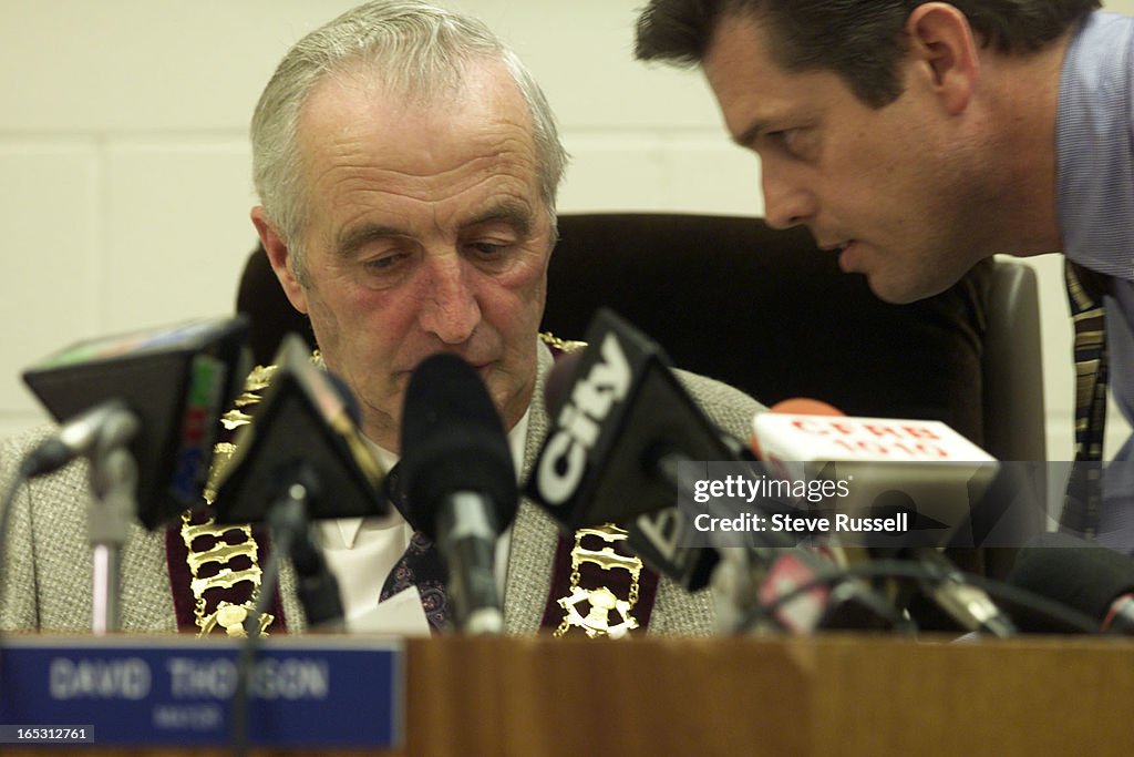 DIGITAL IMAGE----Mayor David Thomson gets last minute instructions from his hired media advisor, Ter