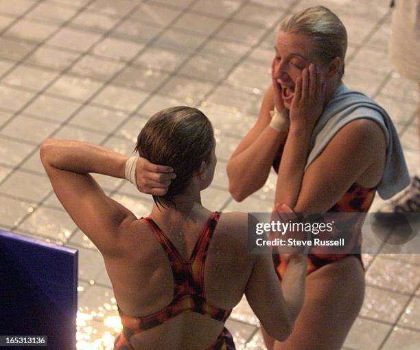 Wow-9/27/2000---Canada's Emilie Heymans, right and Anne Montminy react to their last set of scores that placed them briefly into first at the 2000...