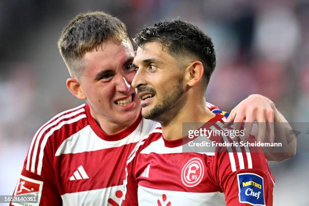 Matthias Zimmermann of Fortuna Düsseldorf celebrates the team's third goal, an own goal by Marvin Wanitzek of Karlsruher SC during the Second...