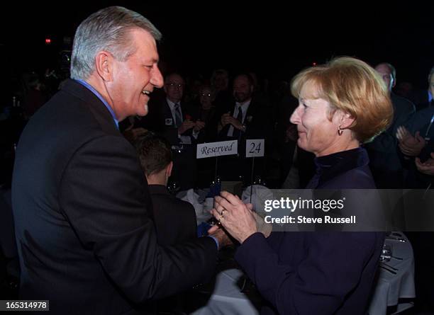 Premier Mike Harris is greeted from wife Janet at the PC policy conference in London, Ontario, October 27, 2001.