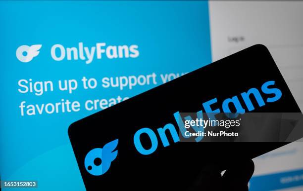 OnlyFans logo displayed on a smart phone with onlyFans web page seen in the background, in this photo illustration. On 07 September 2023 in Brussels,...