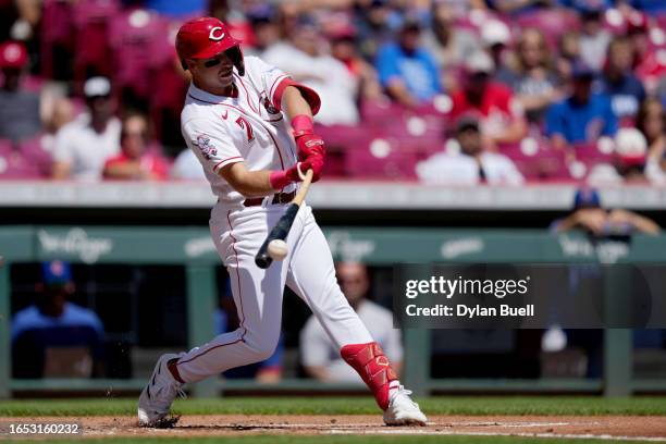 Spencer Steer of the Cincinnati Reds hits a single in the first inning against the Chicago Cubs during game one of a doubleheader at Great American...