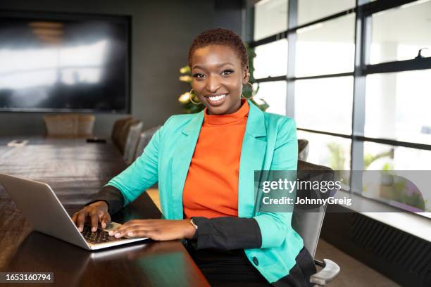 board room portrait of young nairobi businesswoman - kenya woman stock pictures, royalty-free photos & images