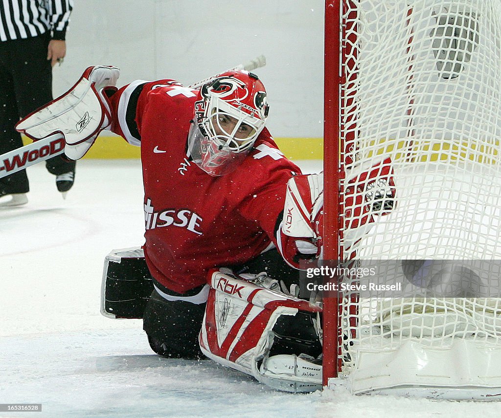 STAROLY--HOCKEY UPSET---02/18/06---Although this one appears to be a goal, Martin Gerber made 49 sav