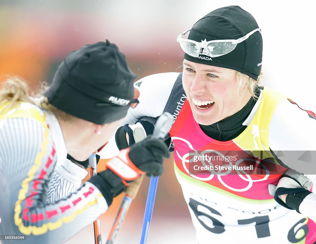 STAROLY-LADIES 10KM X-COUNTRY---02/16/06---Sara Renner is congratulated on a strong finish at the fi