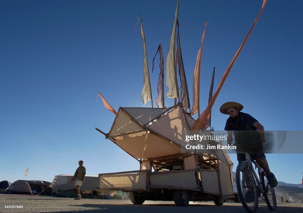 BURNING MAN -- 08/30/05 -- BLACK ROCK DESERT, NV -- A Burning Man art vehicle drives on the playa. A