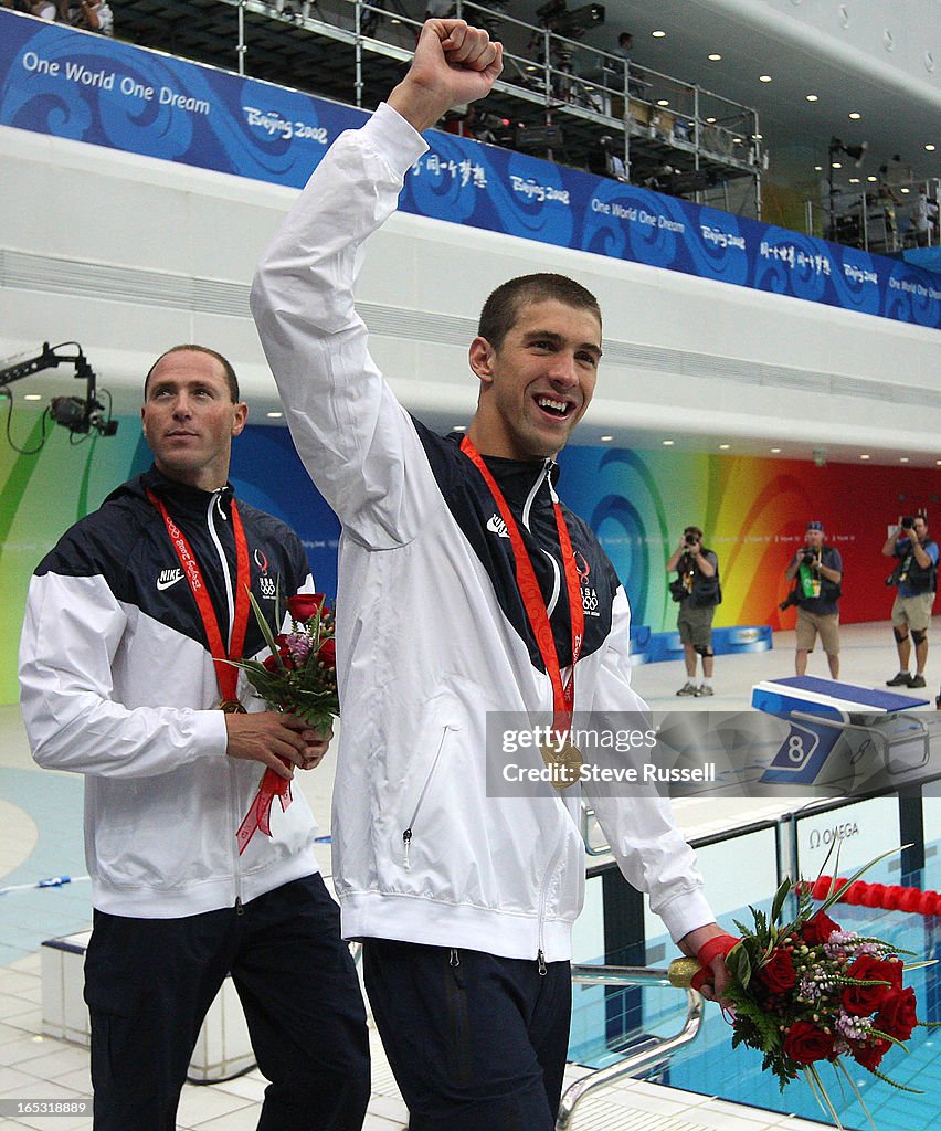 August 11, 2008, Michael Phelps, right , with anchorman Jason Lezak in tow celebrate their victory i