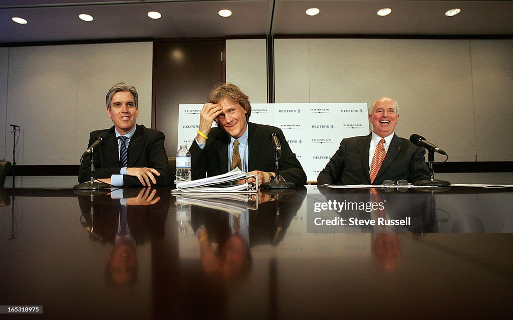 REUTERS + THOMSON--05/16/07---Thomson Deputy Chairman Geoffrey Beattie, (left) Thomson Chairman Davi