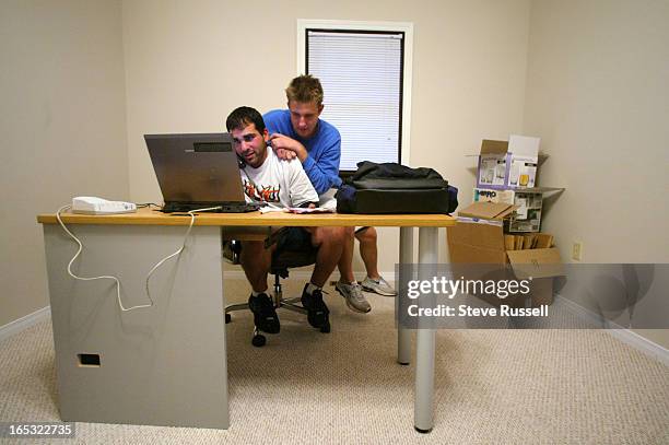 Once a promising first baseman, Ali Modami tries to get his internet up and running with teammate Pete Montrenes at their house in St. Catherines,...