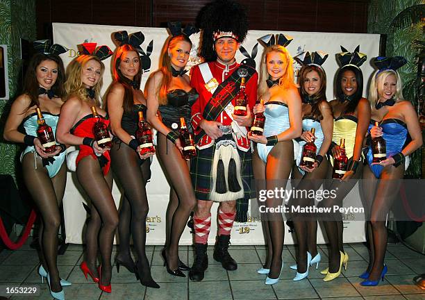 The Dewar's Highlander and Playboy Bunnies Ava Fabian, Deanna Brooks, Vanessa Gleason, Julie Cialini, Nicole Narain, Stephanie Heinrich, Jennifer...