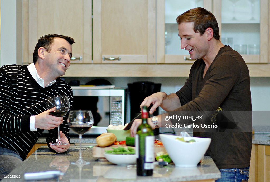 Brian Orser- 03/07/2007 - Brian Orser (left) and his partner Jason Forbes cook dinner at their home