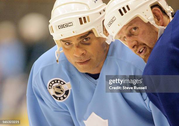 Gary Roberts and Tie Domi have a chat during practice. The Toronto Maple Leafs practice between games versus the Ottawa Senators in the second round...