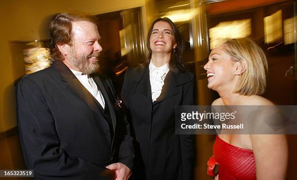 Bjorn Ulvaeuss, Kim Huffman, and Anna Madgett, laugh at a reception at Carlu after Huffman thanked Ulvaeuss for the music, October 15, 2003.