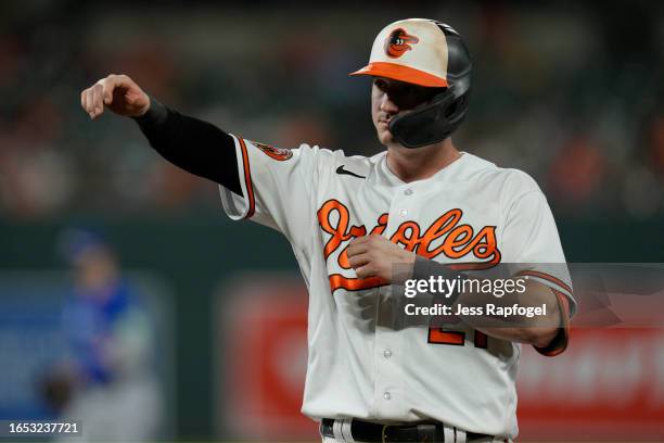 Austin Hays of the Baltimore Orioles reacts after he hits a single against the Toronto Blue Jays during the fifth inning at Oriole Park at Camden...