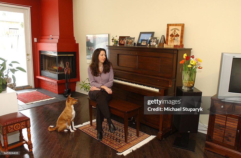 Michael Rasky TORONTO, Ontario, Holly Rasky with her dog Marcus in her newly... News ...