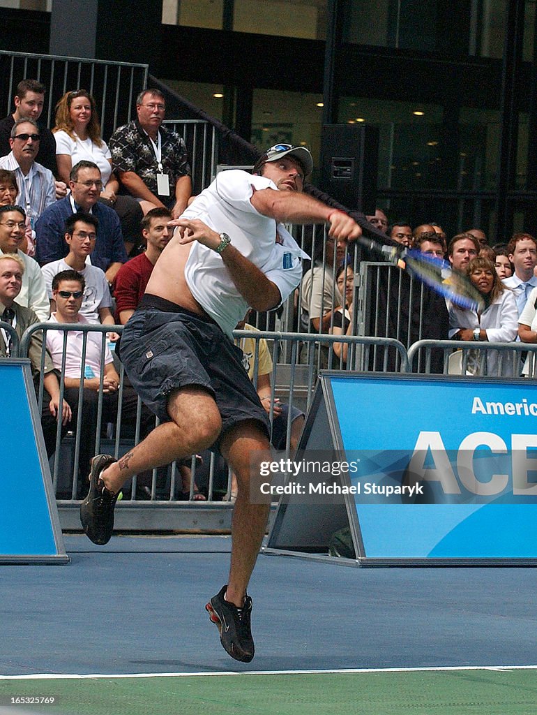 EVERT (08/11/05) TORONTO, ONT New Leaf Jason Allison returns a hit at Tennis Legends Challenge at TD
