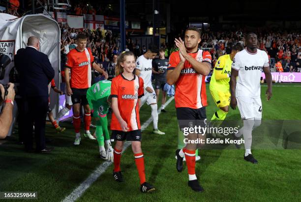 Carlton Morris of Luton Town leads his side out prior to the Premier League match between Luton Town and West Ham United at Kenilworth Road on...