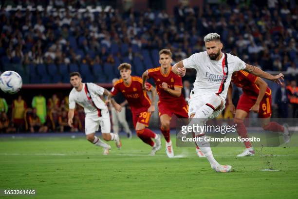 Olivier Giroud of AC Milan scores a goal from the penalty spot during the Serie A TIM match between AS Roma and AC Milan at Stadio Olimpico on...