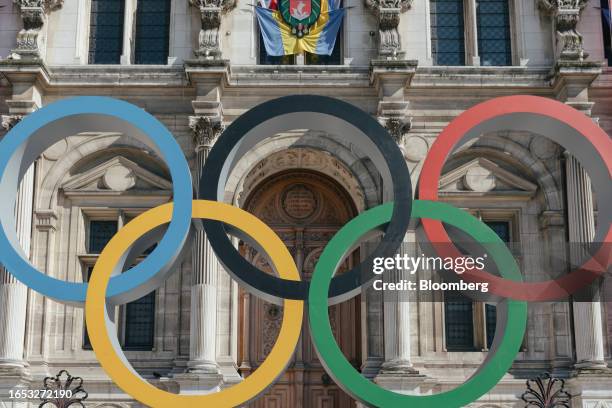 The Olympic rings display outside Paris city hall in Paris, France, on Thursday, Sept. 7, 2023. The Summer Olympics will take place next year between...