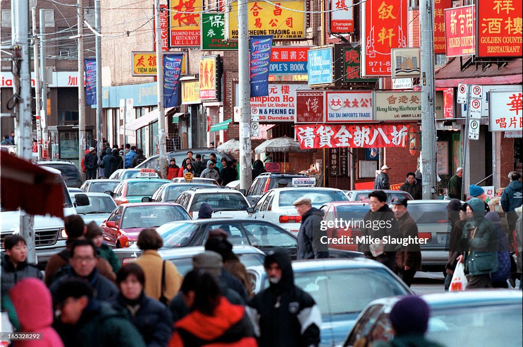 While the rest of the downtown core is relatiivly deseterted, Chinatown, on Dundas looking west from