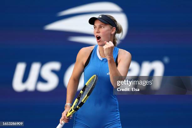 Caroline Wozniacki of Denmark celebrates a point against Jennifer Brady of the United States during their Women's Singles Third Round match on Day...