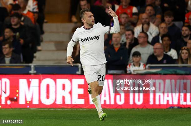 Jarrod Bowen of West Ham United celebrates after scoring the team's first goal during the Premier League match between Luton Town and West Ham United...