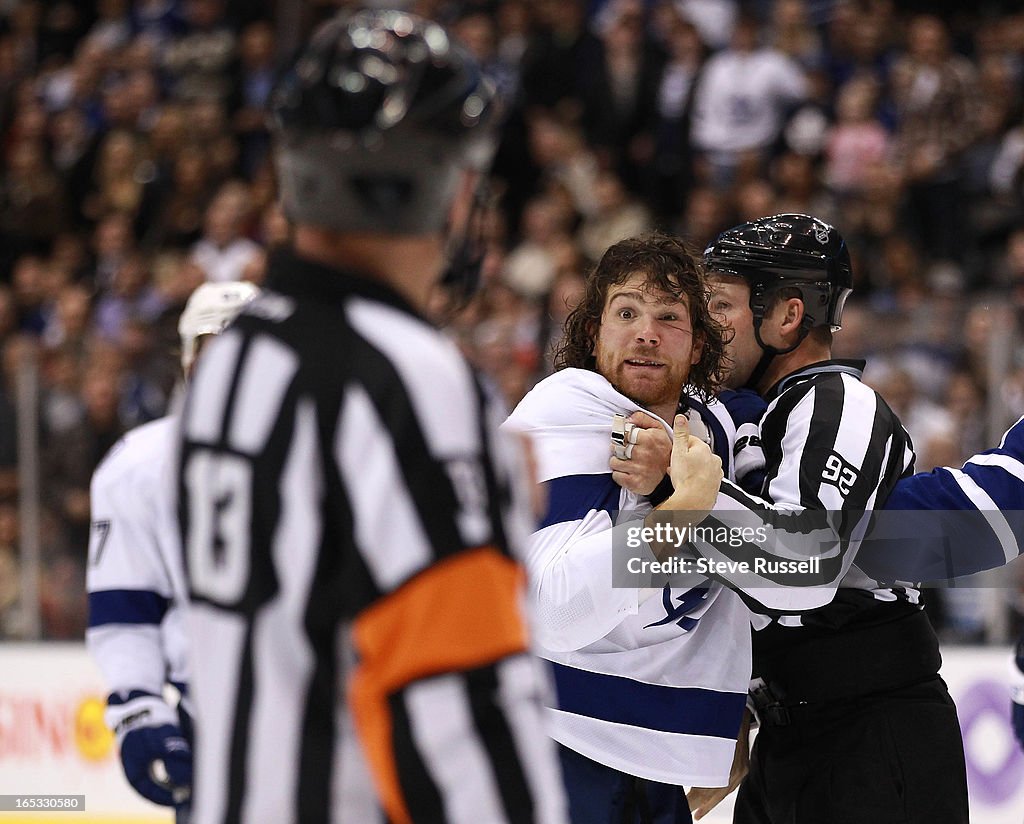 Tampa Bay Lightning right wing Steve Downie #9 pleads his case on play that amounted to 16 penalty m