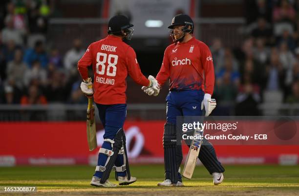 Jonathan Bairstow and Harry Brook of England shake hands during the 2nd Vitality T20 International between England and New Zealand at Emirates Old...