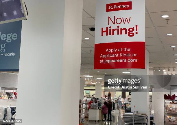 Help wanted sign is posted inside a JCPenney store at The Shops at Tanforan on September 01, 2023 in San Bruno, California. Retailer JCPenney...
