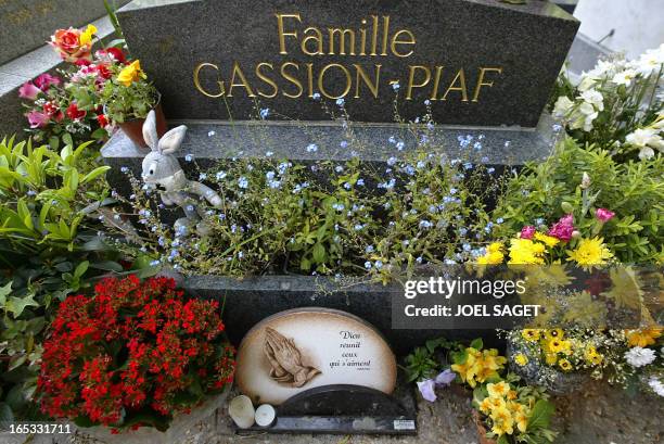 Photo taken 14 May 2004 of French singer Edith Piaf's gravestone at Pere Lachaise Cemetery in Paris. Pere Lachaise is the largest cemetery in Paris...