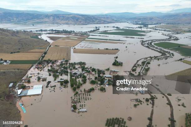 An aerial view of a flooded field as heavy machines try to clean the roads after heavy rain in Thessaly, Greece on September 7, 2023.