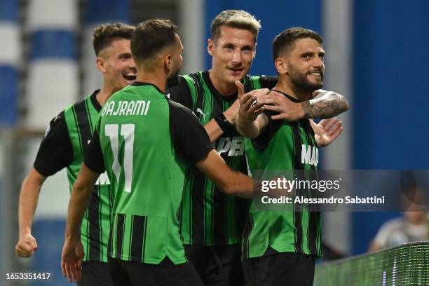 Domenico Berardi of US Sassuolo celebrates after scoring his team third goal during the Serie A TIM match between US Sassuolo and Hellas Verona FC at...