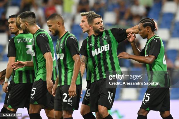 Domenico Berardi of US Sassuolo celebrates after scoring his team third goal during the Serie A TIM match between US Sassuolo and Hellas Verona FC at...