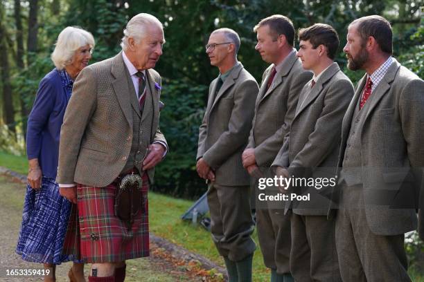 King Charles III and Queen Camilla meet estate staff and members of the public as they depart Crathie Parish Church following a church service to...