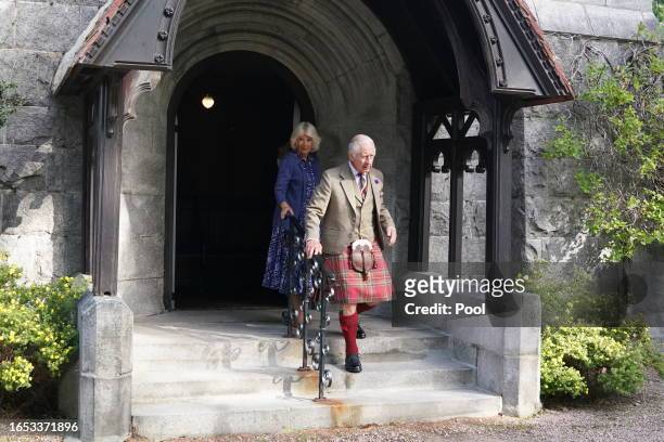 King Charles III and Queen Camilla depart Crathie Parish Church following a church service to mark the first anniversary of the death of Queen...