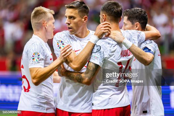 Karol Swiderski, Jan Bednarek, Jakub Kiwior, Robert Lewandowski of Poland celebrate a goal during the UEFA EURO 2024 qualifying match between Poland...