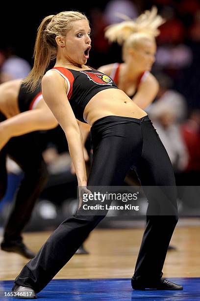 Cheerleaders of the Louisville Cardinals perform during a game against the Duke Blue Devils during the Midwest Regional Final of the 2013 NCAA Men's...