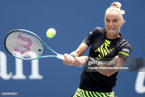 Arantxa Rus of the Netherlands returns a shot Madison Keys of the United States during their Women's Singles First Round match on Day Two of the 2023...