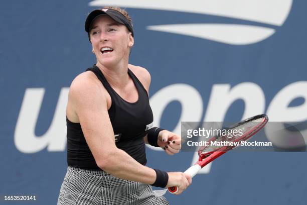 Madison Brengle of the United States returns a shot against Linda Noskova of the Czech Republic during their Women's Singles First Round match on Day...
