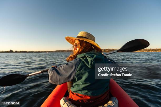 girl in a kayak in the pacific ocean, mission bay, san diego, california - mission bay san diego stock pictures, royalty-free photos & images