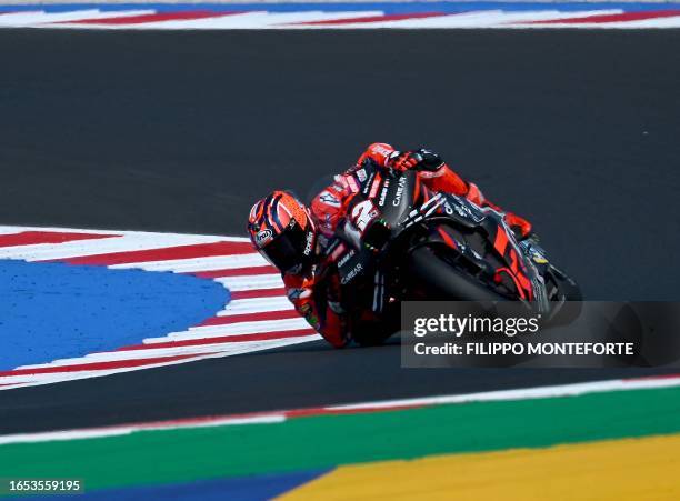 Aprilia Racing's Spanish rider Maverick Vinales rides his motorbike during a free practice session of the San Marino MotoGP Grand Prix at the Misano...