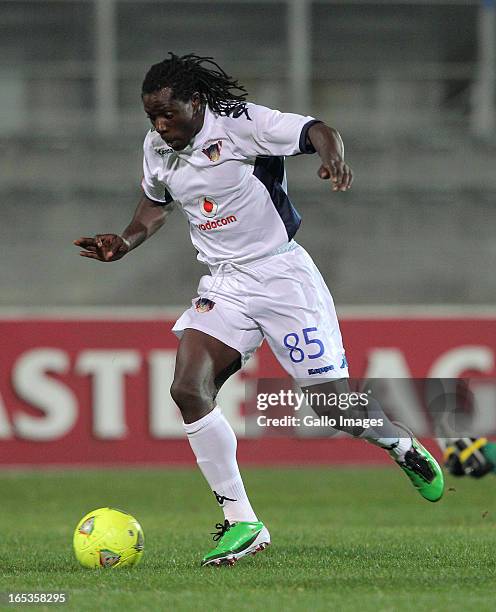 Benjani Mwaruwari from Chippa United FC beats the Golden Arrow keeper to score during the Absa Premiership match between Chippa United and Golden...