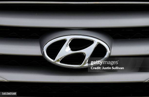 The Hyundai logo is displayed on the front of a new car at Petaluma Hyundai on April 3, 2013 in Petaluma, California. Hyundai and Kia announced a...