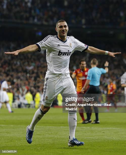 Karim Benzema of Real Madrid celebrates after scoring his team's second goal during the UEFA Champions League Quarter Final match between Real Madrid...