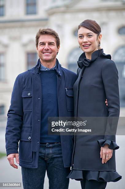 Olga Kurylenko and Tom Cruise attend a photo call for the film 'Oblivion' at Belvedere Palace on April 2, 2013 in Vienna, Austria.