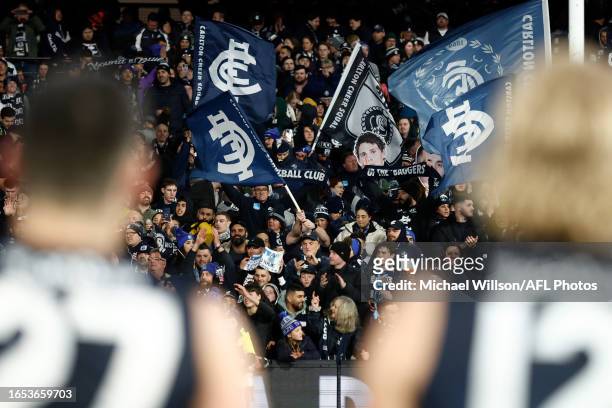 Blues fans celebrate during the 2023 AFL First Elimination Final match between the Carlton Blues and the Sydney Swans at Melbourne Cricket Ground on...