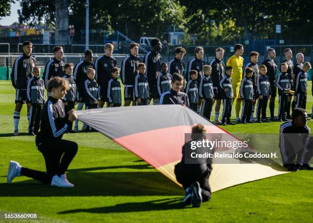 The players of Germany line up for the national anthem prior to the International friendly match between Germany U20 and Italy U20 at Stadion am...