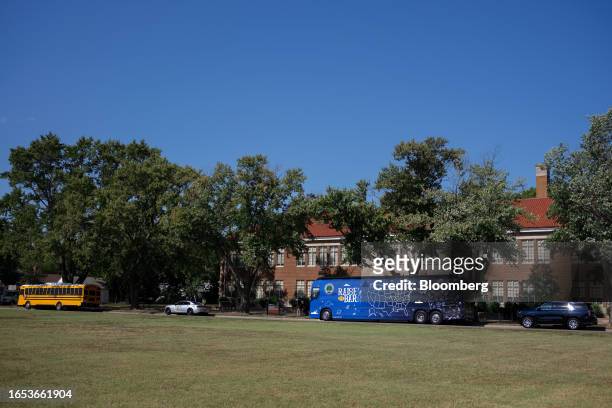 The bus for US Education Secretary Miguel Cardona's bus tour outside the Brown v. Board of Education historic site, a part of the Department of...