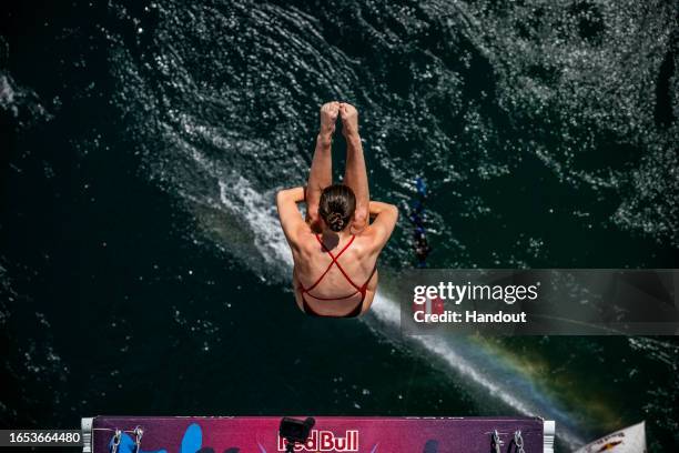 In this handout image provided by Red Bull, Simone Leathead of Canada dives from the 21 metre platform on Stari Most during the second competition...